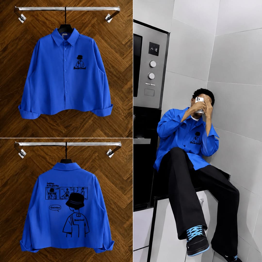 Blue oversized graphic button-up shirt shown on hanger from front and back, plus worn by model.