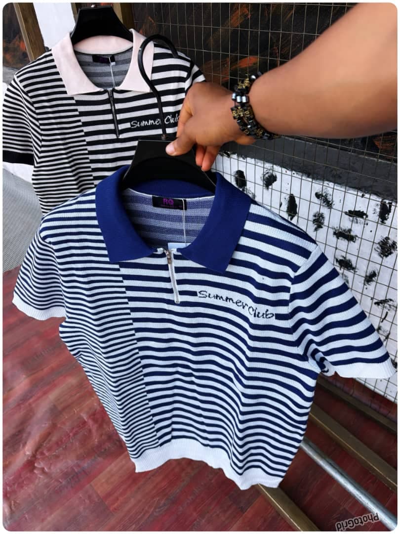 Blue and white striped polo with Summer Club text on hanger and black striped version behind.