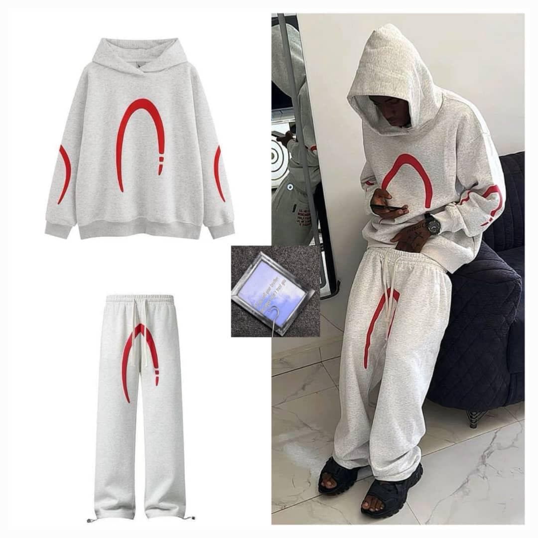 Light gray hoodie and pants with red arch graphics shown in collage with model wearing the set.