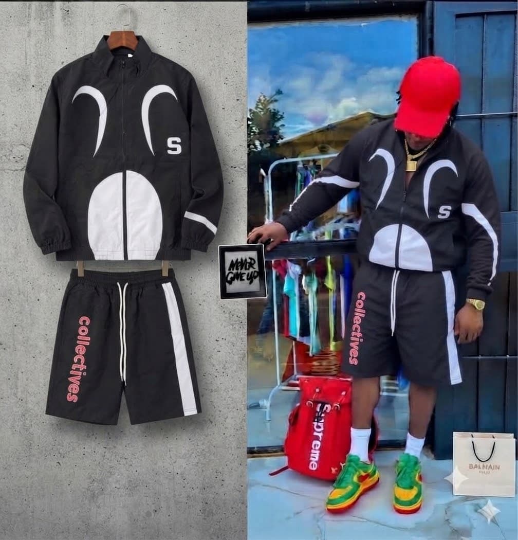Black graphic zip-up jacket and shorts set shown in flat lay and on model.