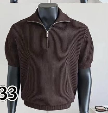 Brown ribbed quarter-zip polo shirt on mannequin.