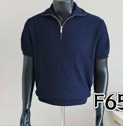 Navy ribbed quarter-zip polo shirt on mannequin.