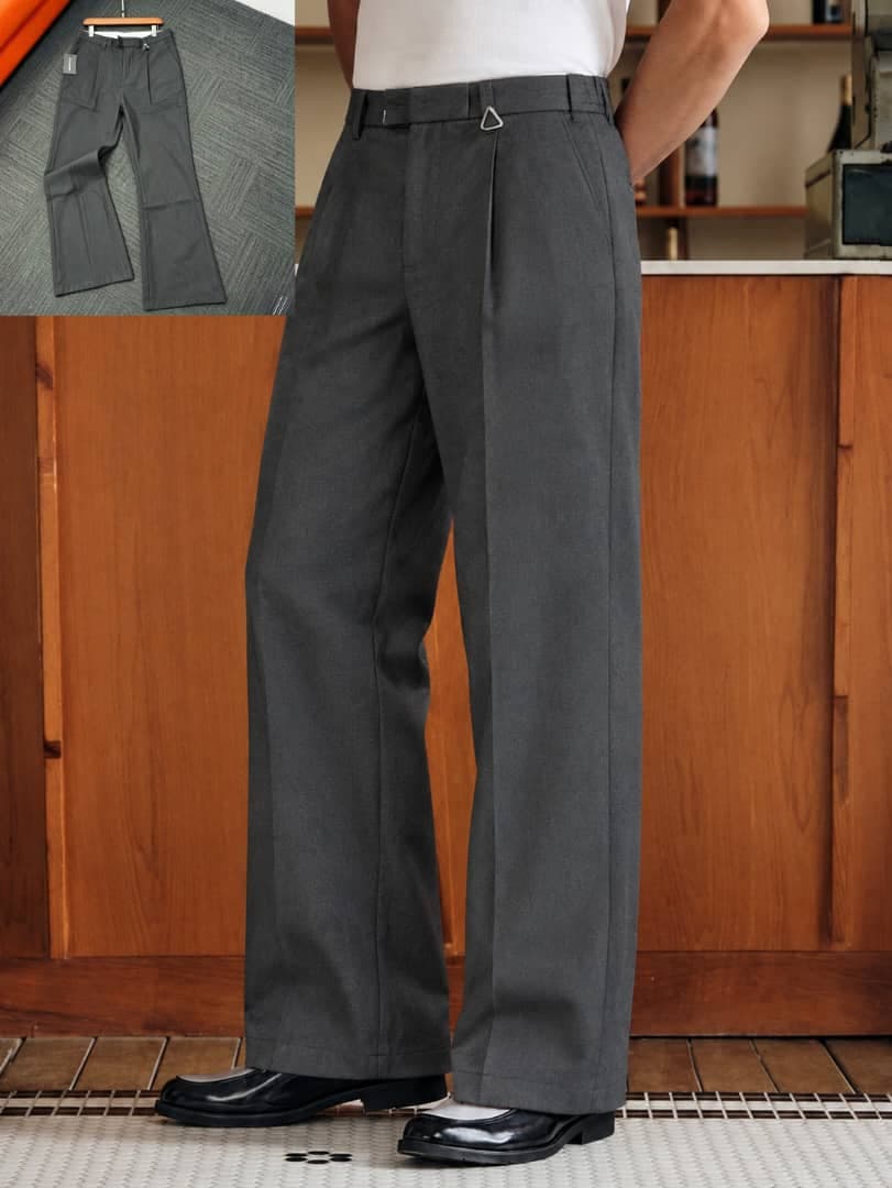 Model wearing gray pleated flare trousers with white t-shirt, side adjusters visible, flat lay inset.