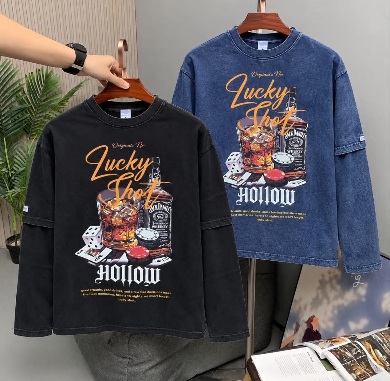 Black and blue stone-washed Lucky Shot Hollow graphic tees with detailed gambling and drink motif.