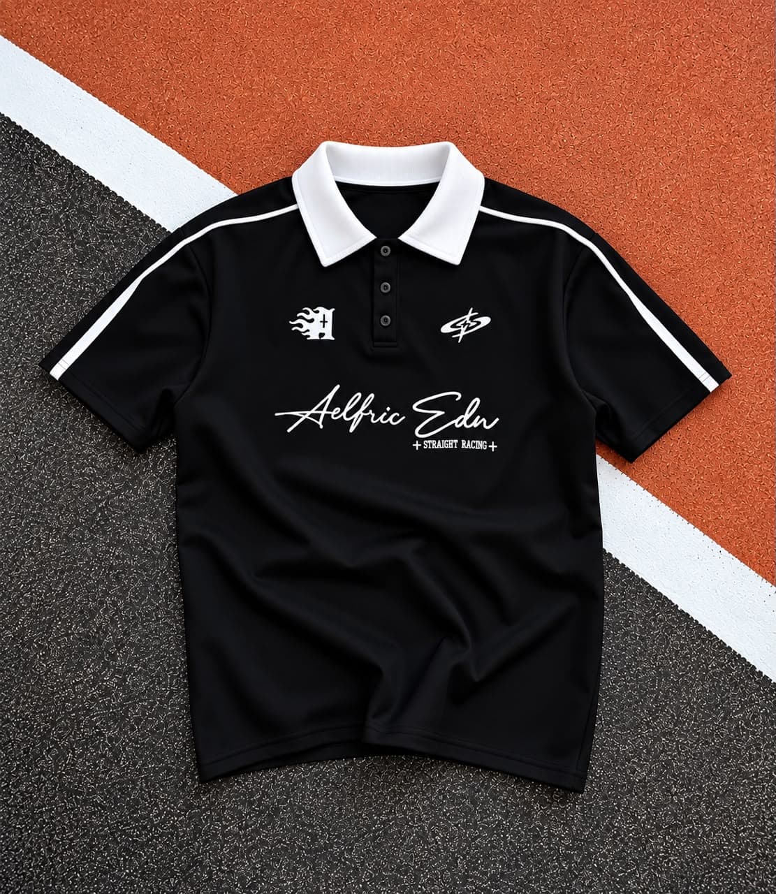 Yellow Aelfric Edn polo shirt flat lay on orange and black surface.