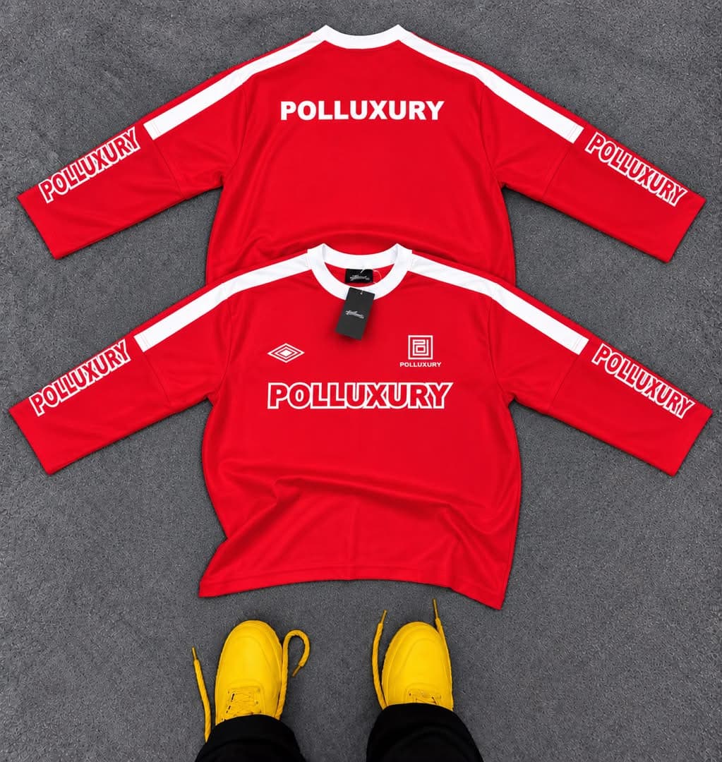 Front and back views of the blue Polluxury long sleeve jersey.