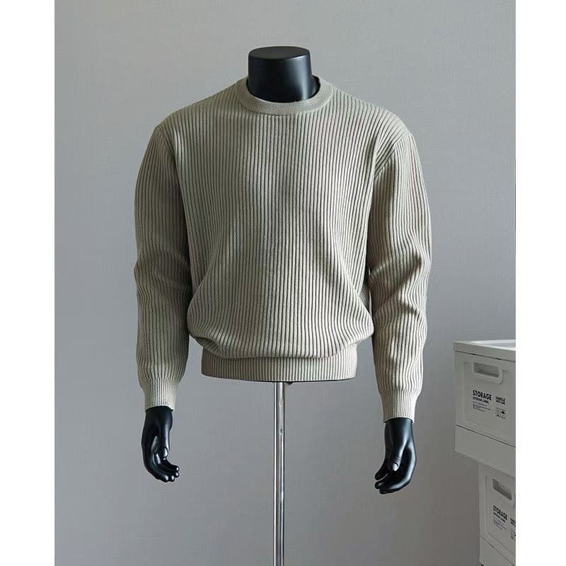 Olive ribbed knit crewneck sweater on mannequin.