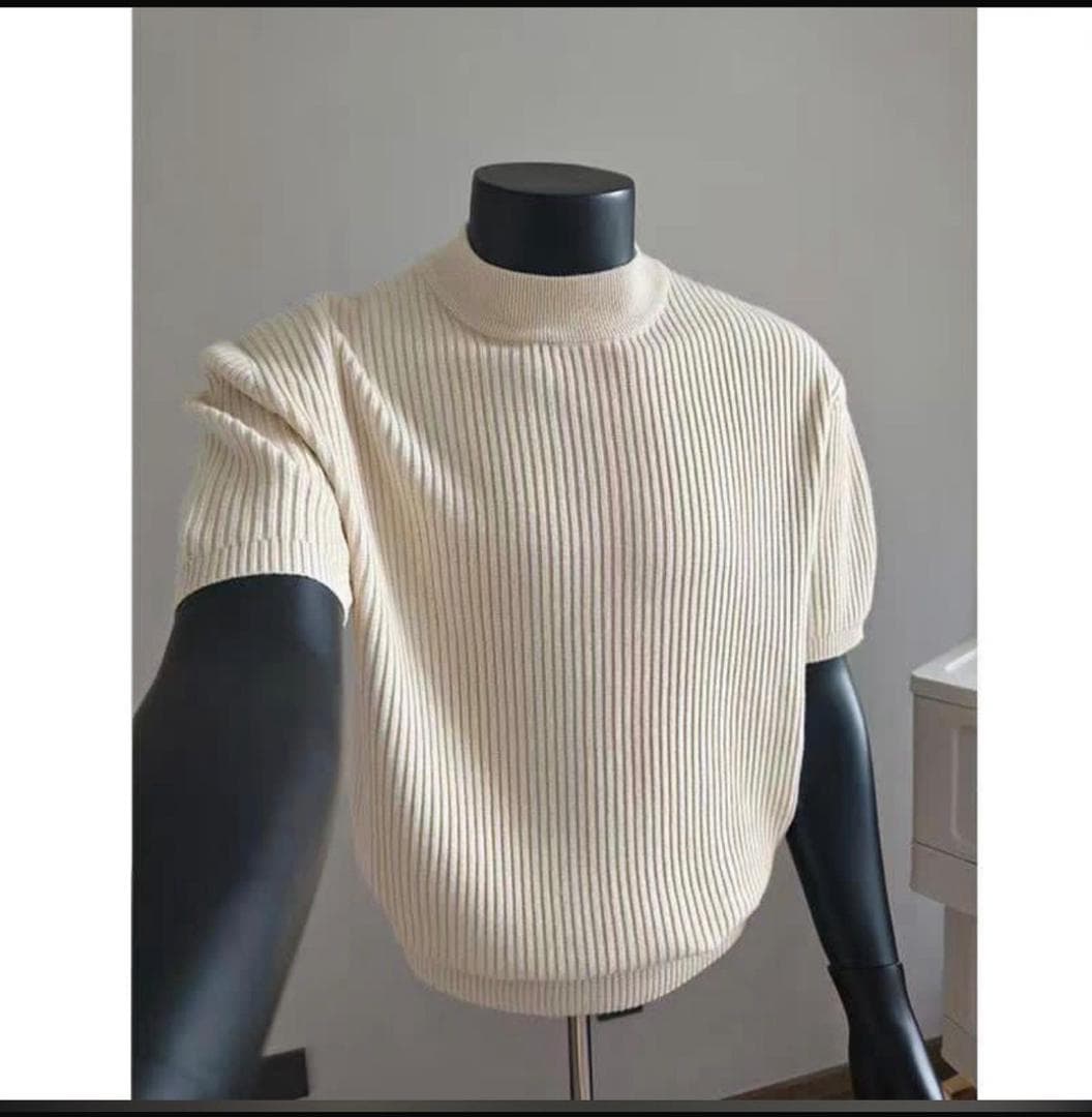 Cream ribbed knit mock neck short sleeve top on mannequin.