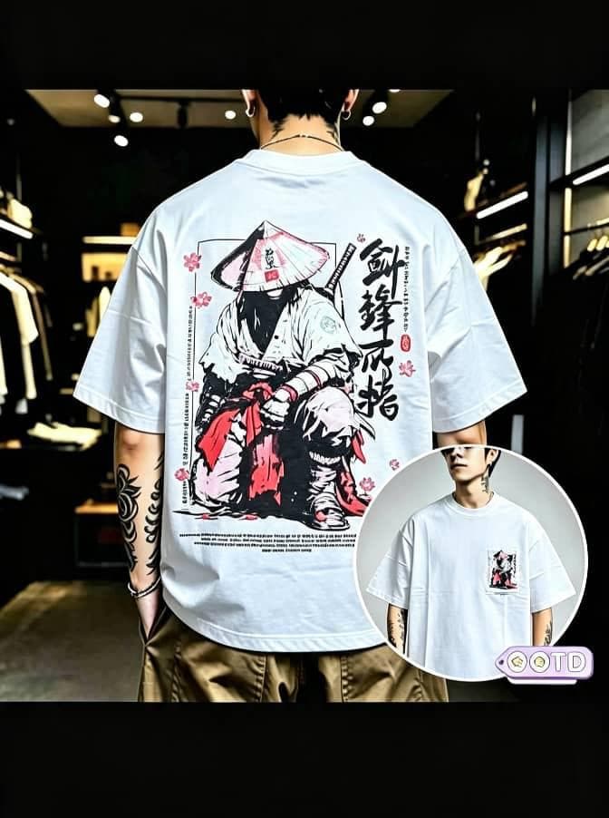 Model from behind in white oversized T-shirt with large samurai warrior graphic, Japanese text and cherry blossoms on back, circular front inset.