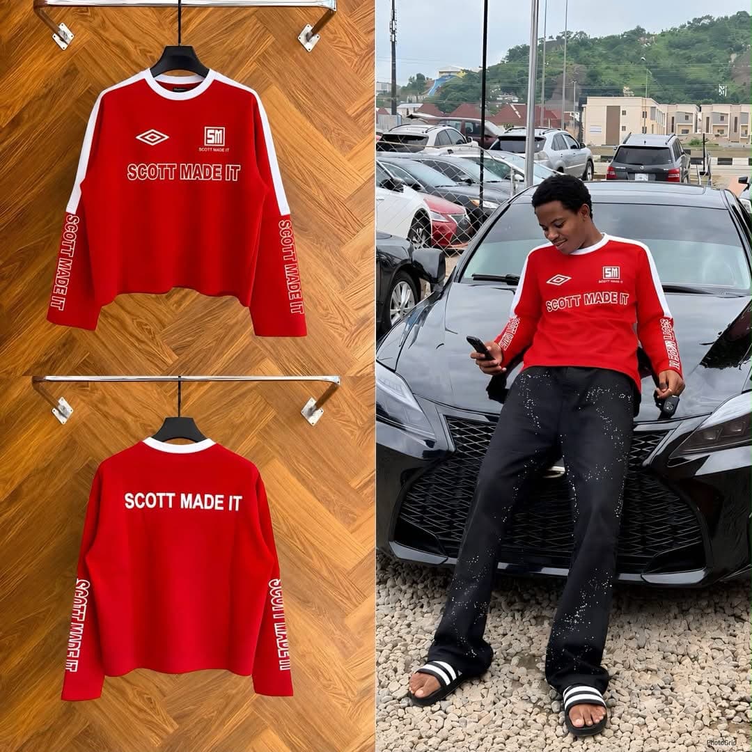 Red Scott Made It cropped long sleeve sweatshirt with white accents shown in flat lay and model posing outdoors.