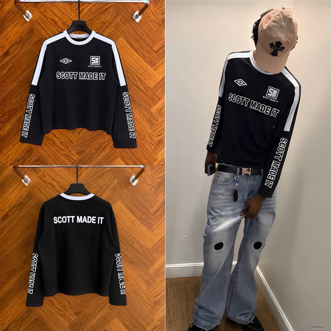 Black Scott Made It cropped long sleeve sweatshirt with white accents in flat lay and on model with jeans.