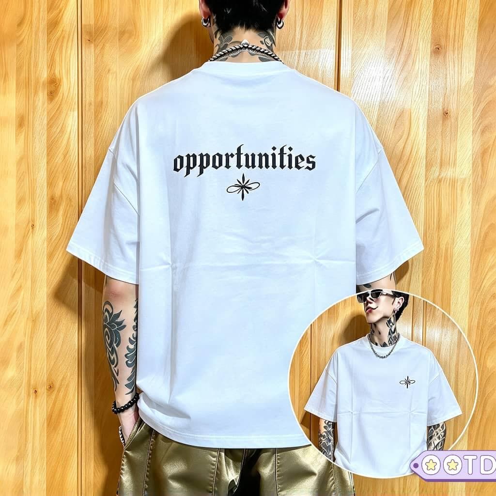 Man wearing black stylized graphic t-shirt with white text design on chest.