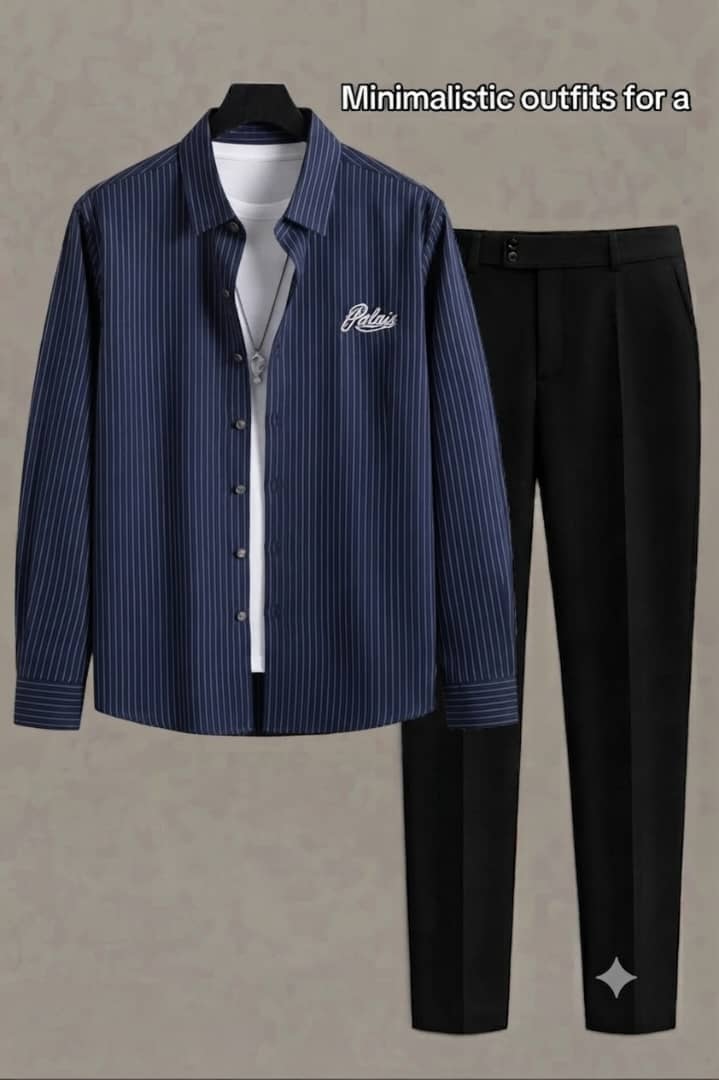 Palais navy striped shirt worn open over white tee with necklace and black trousers.