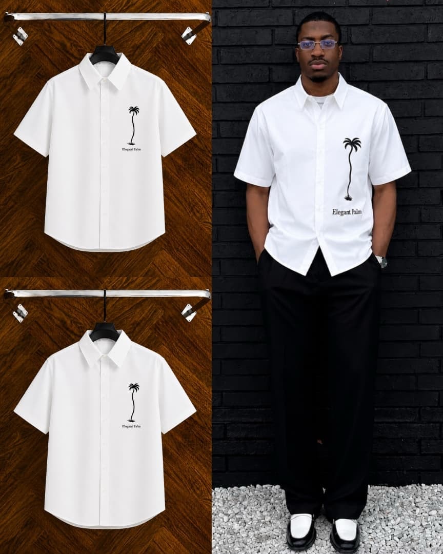 White short sleeve Elegant Palm shirt shown flat on hanger and on model with black pants.