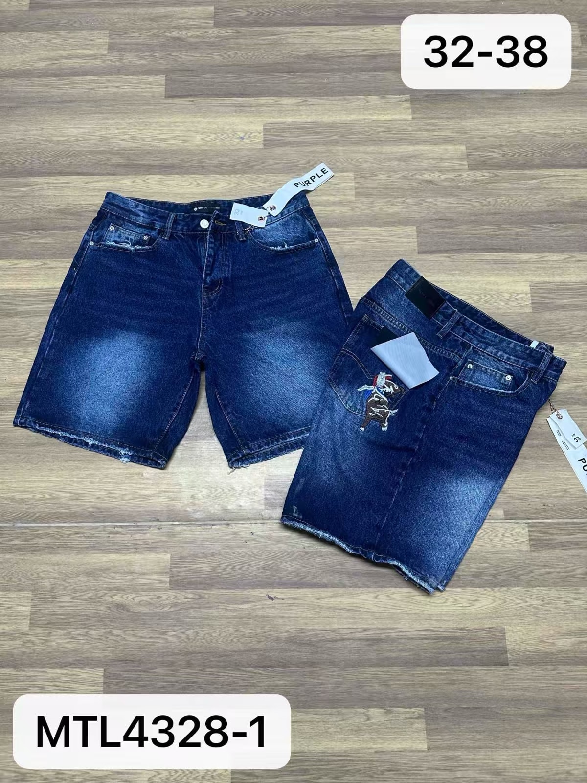 Front and back views of dark blue denim shorts with embroidery on back pocket and Purple tag.