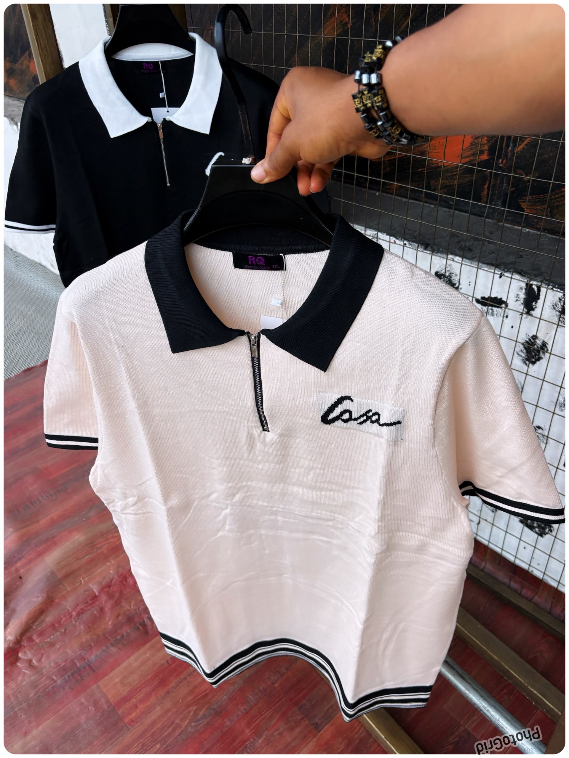 Cream and black contrast collar half-zip polo shirts with Casa embroidery.