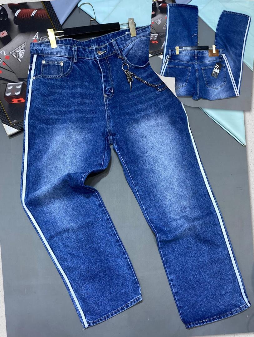 Blue jeans with white side stripes, chain accessory and inset back view.
