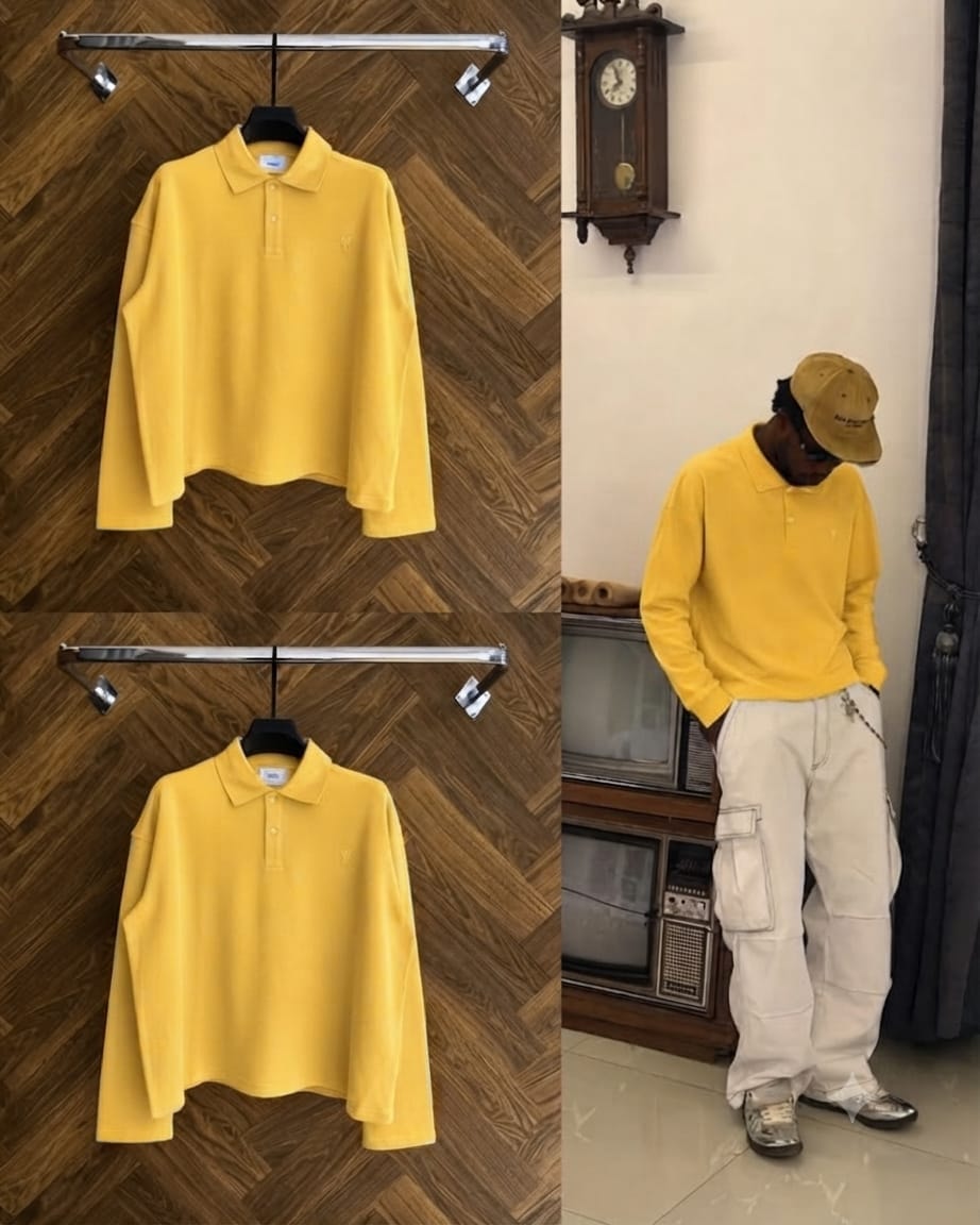 Yellow oversized long sleeve polo shirt shown in flat lay and worn by model with white cargos.
