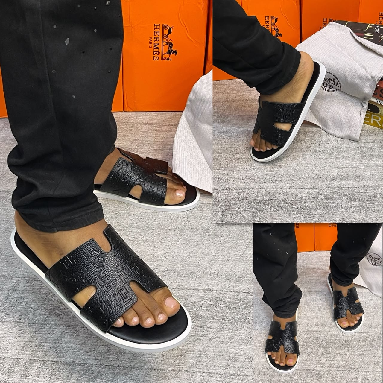Black embossed monogram Hermes Pam sandals with white sole on model.