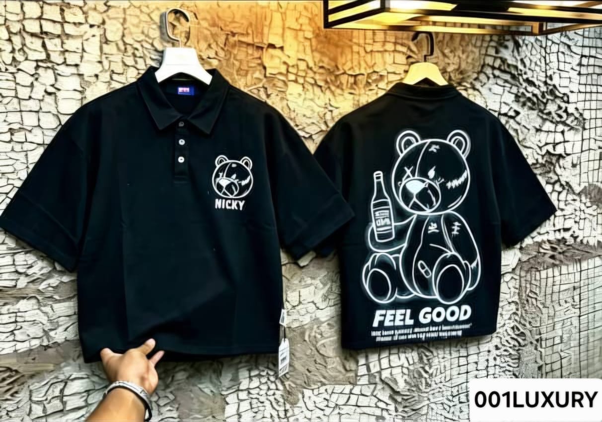 Black polo shirt front and back with Nicky bear and Feel Good teddy graphic.