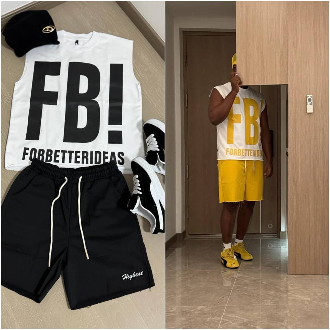 White sleeveless top with black FB! graphic, black shorts, cap and sneakers.