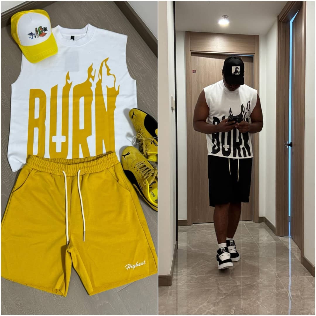 White sleeveless top with yellow BURN flame graphic, yellow shorts, cap and sneakers.