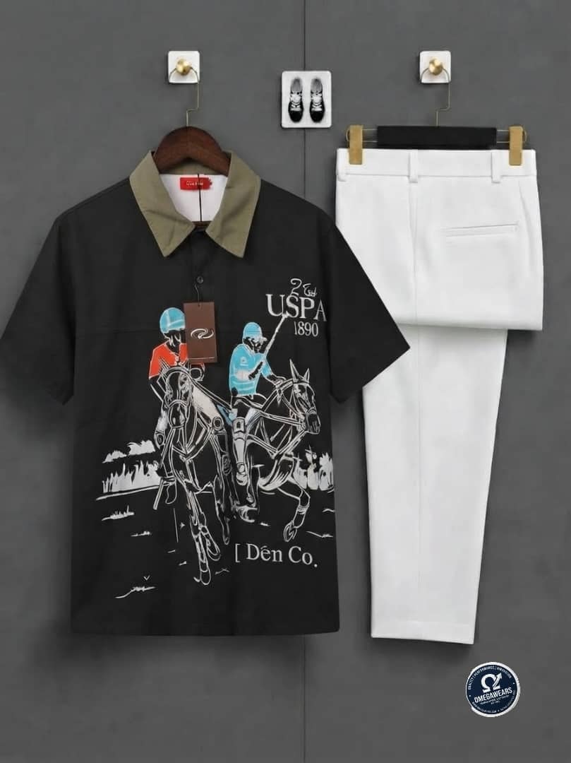 Black graphic shirt with polo players print and white trousers.