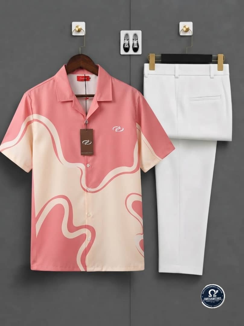 Pink and cream wave print short sleeve shirt paired with white trousers.