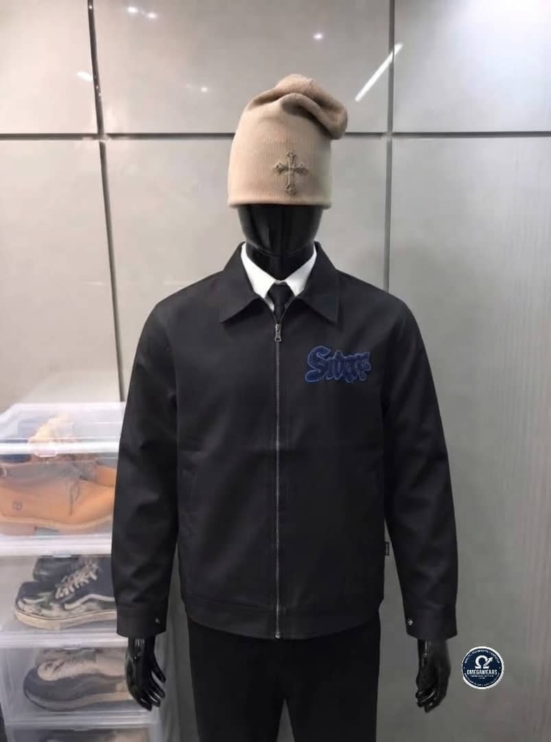 Black Swag embroidered zip-up jacket on mannequin.