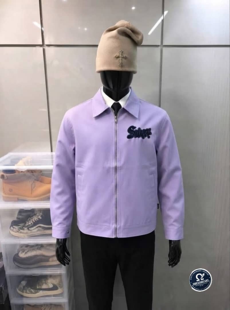 Purple Swag embroidered zip-up jacket on mannequin.