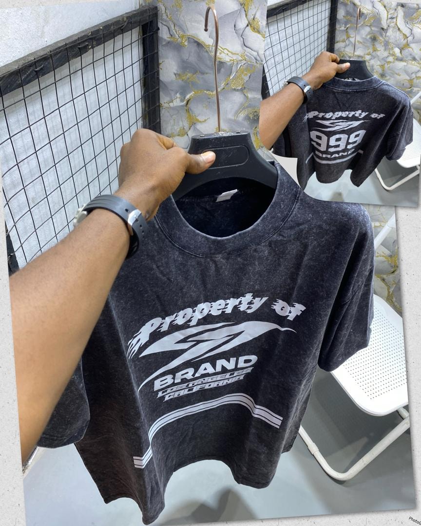 Black stone wash t-shirt with Property of 99 Brand and lightning graphic on front and back inset.