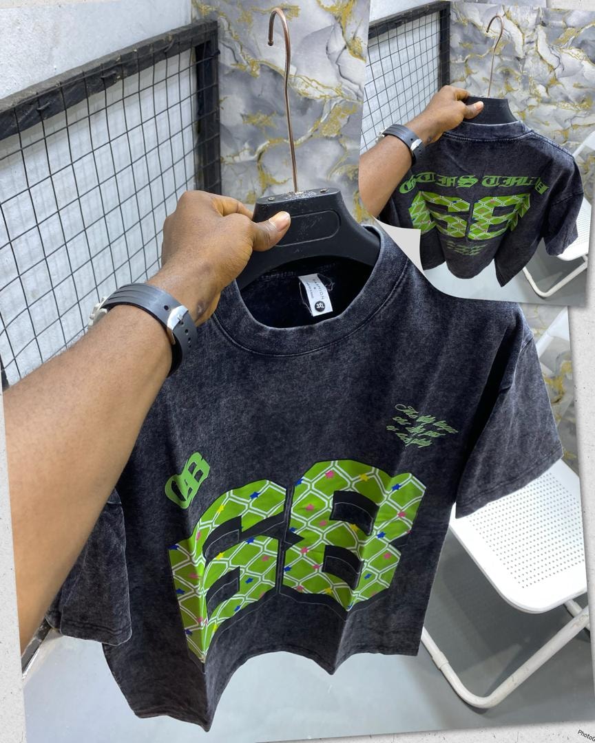 Black stone wash t-shirt featuring large green 88 pattern with back and sleeve details inset.