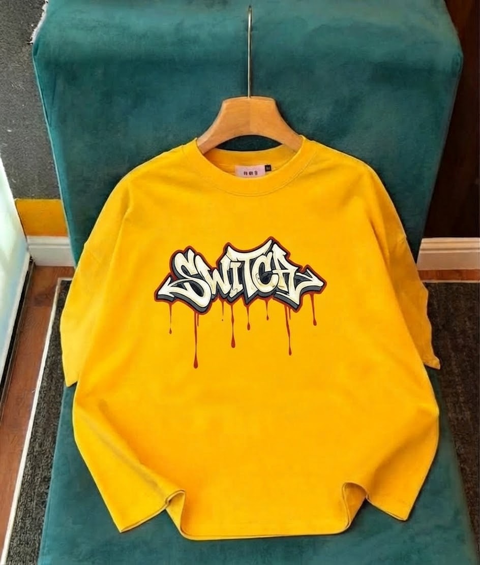 Yellow long sleeve top with Switch graffiti print.