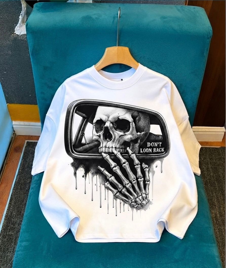 White long sleeve top with skull in mirror graphic.