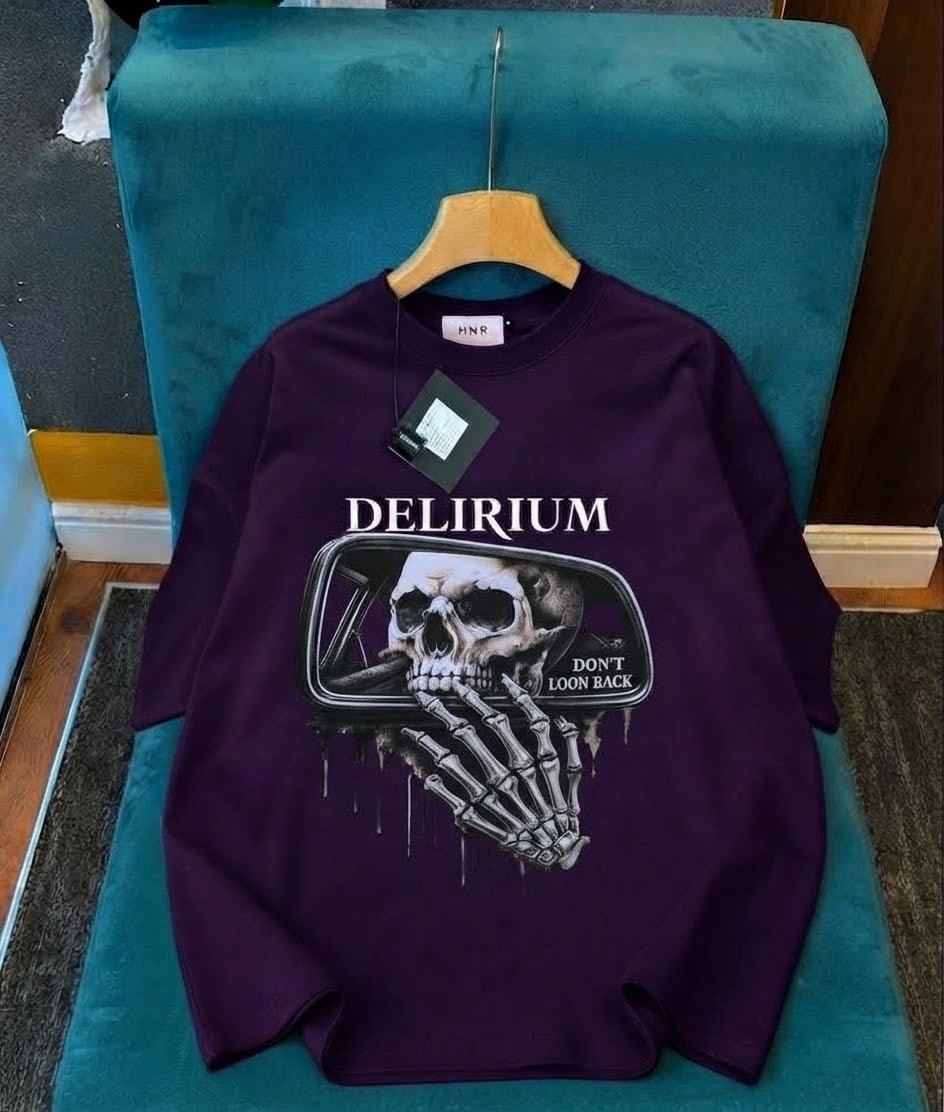 Purple long sleeve top with Delirium skull in mirror graphic.