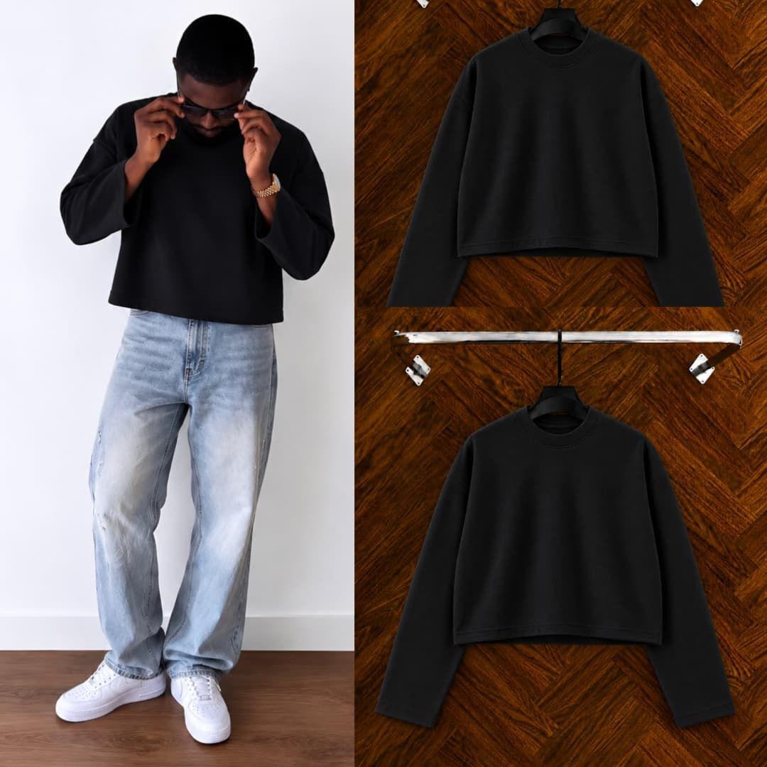 Man modeling black cropped sweatshirt with jeans and sneakers, plus flat lay views.