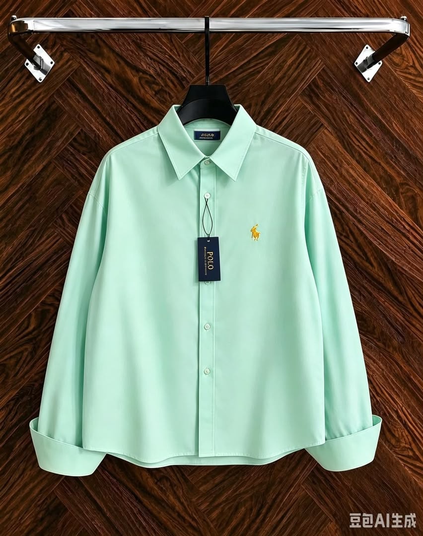 Light green long sleeve button-down Polo shirt on hanger showing chest logo and tag.