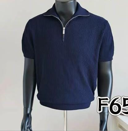 Navy ribbed quarter-zip polo shirt on mannequin.