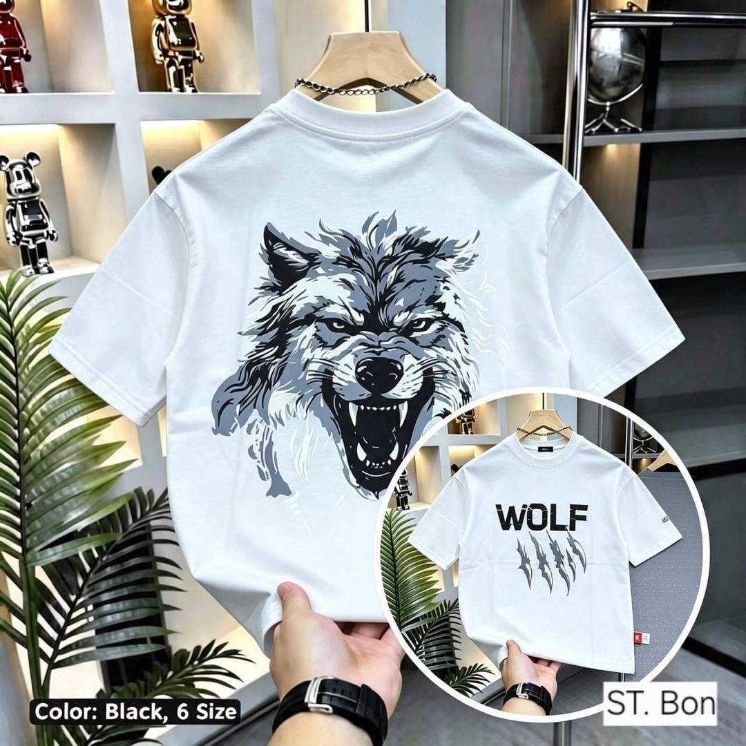 White wolf graphic t-shirt held showing back wolf head print with inset of front WOLF design.