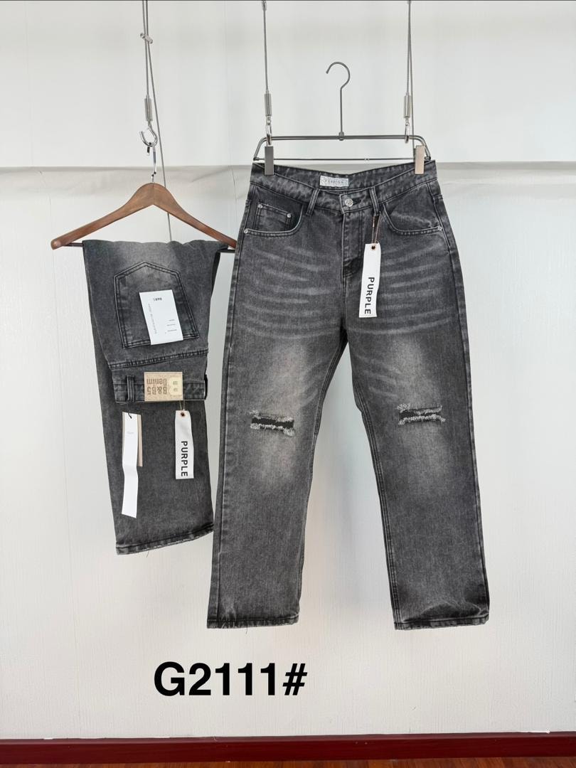 White flare jeans with black cursive script print on the leg, front and back views with tags.