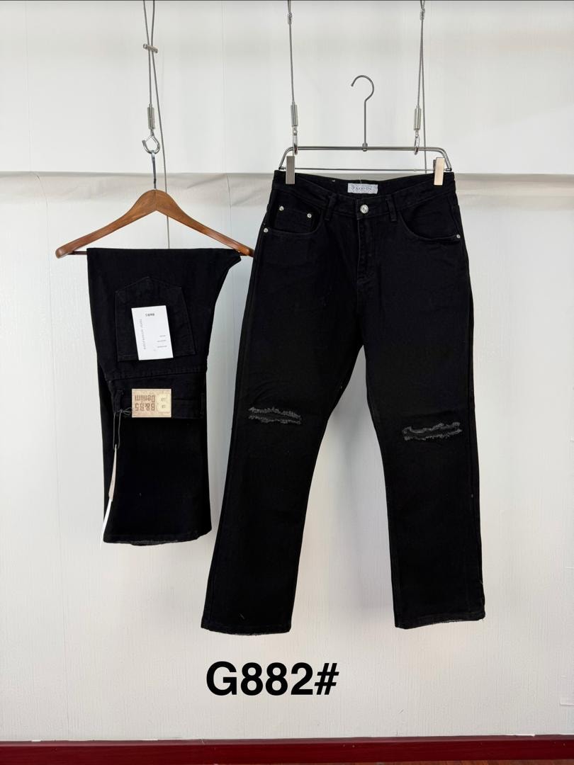 Black ripped flare jeans with knee distress, shown hanging and folded with tags and G882 label.