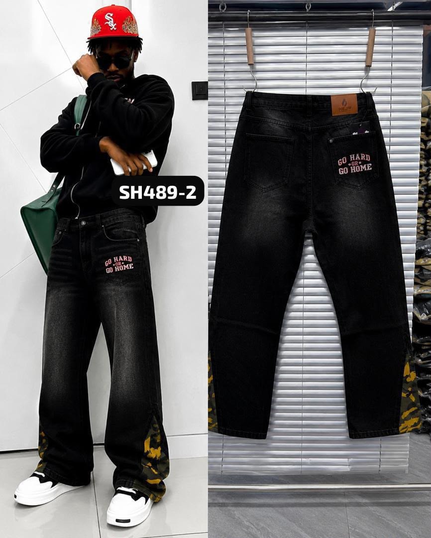 Black jeans with GO HARD OR GO HOME embroidery and camo bottom accents, shown on model and back view.