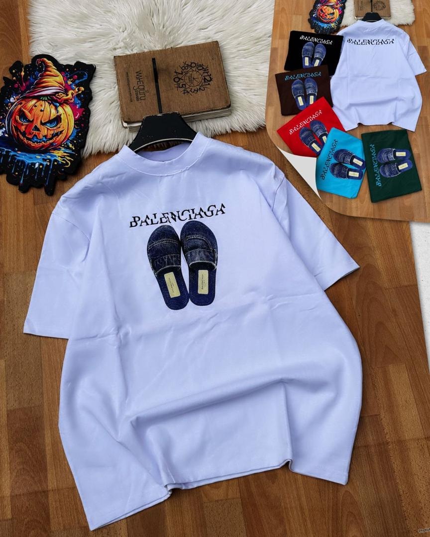 White Balenciaga slipper graphic t-shirt displayed on hanger.