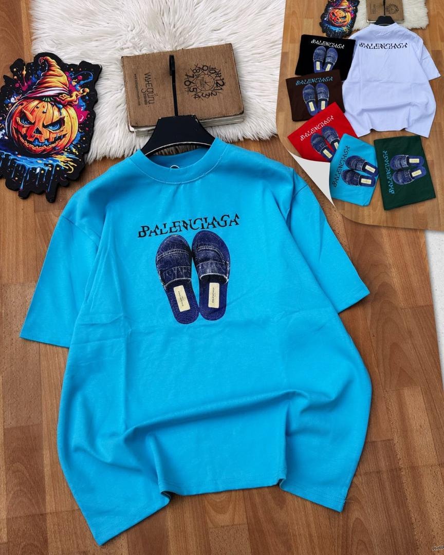 Blue Balenciaga slipper graphic t-shirt laid flat.