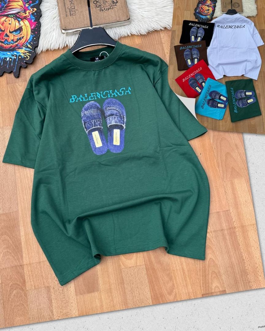 Green Balenciaga slipper graphic t-shirt on hanger.