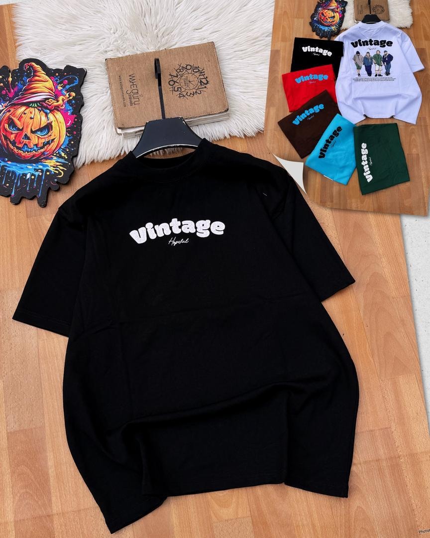 Black Vintage Hopeful logo t-shirt displayed on hanger.