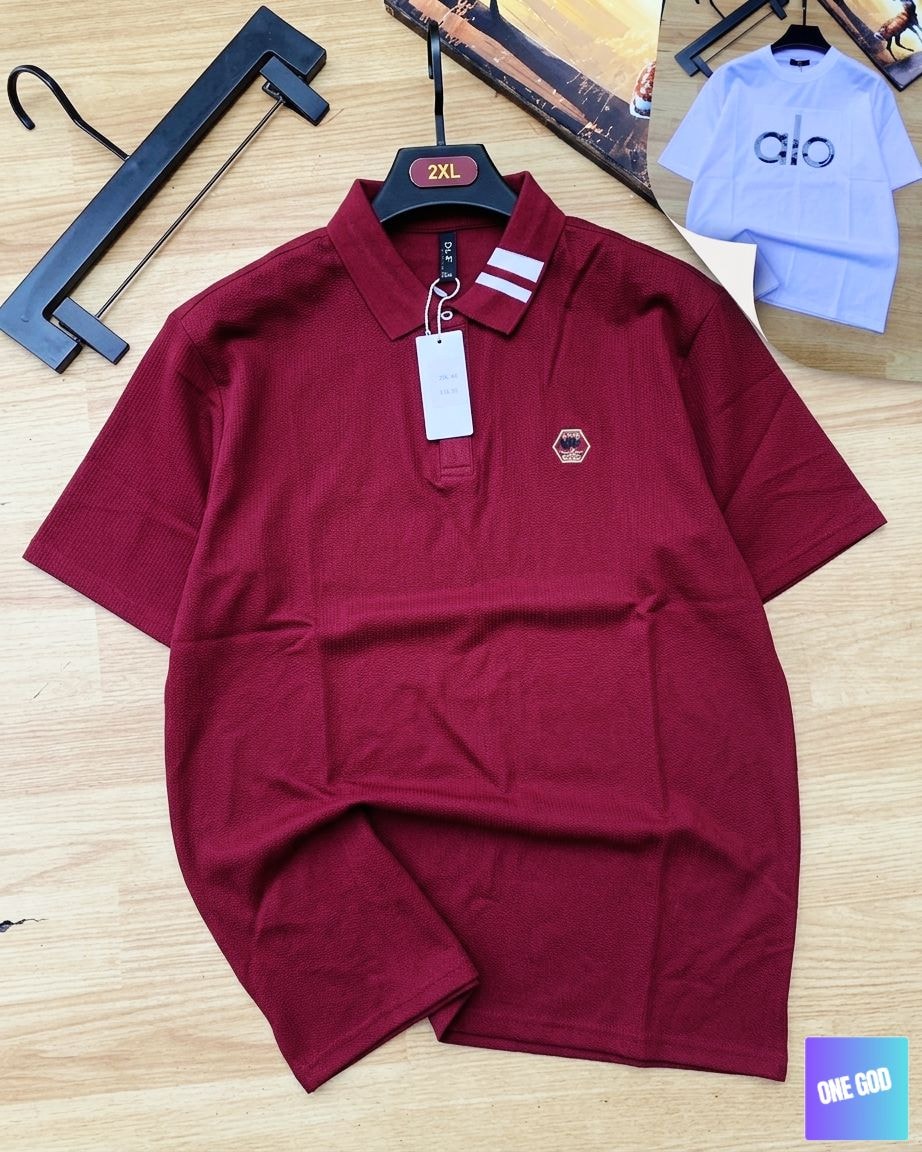 Maroon luxury polo shirt with white striped collar and hexagon chest logo.