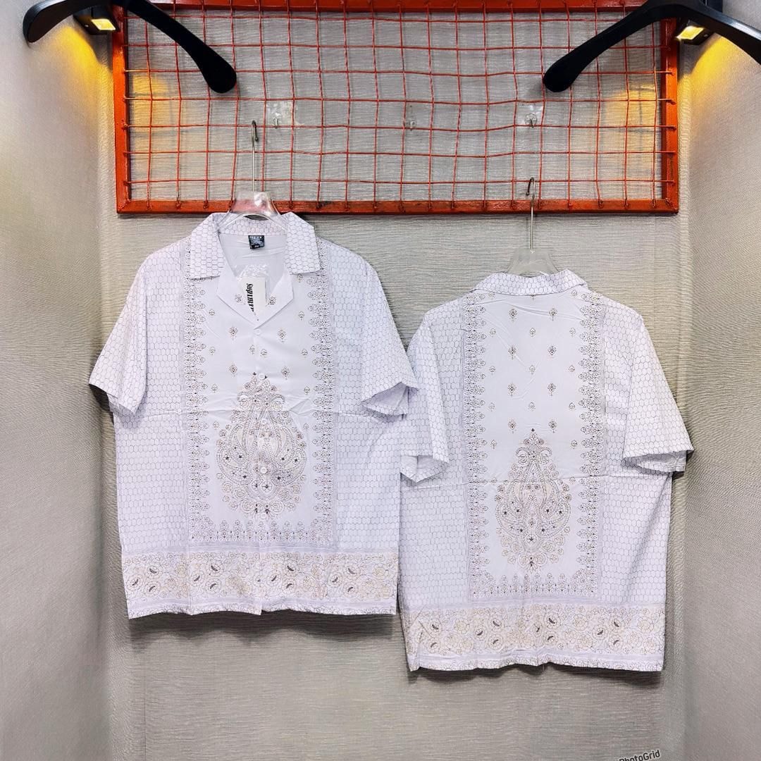 Front and back views of white short sleeve shirt with intricate paisley and border patterns.