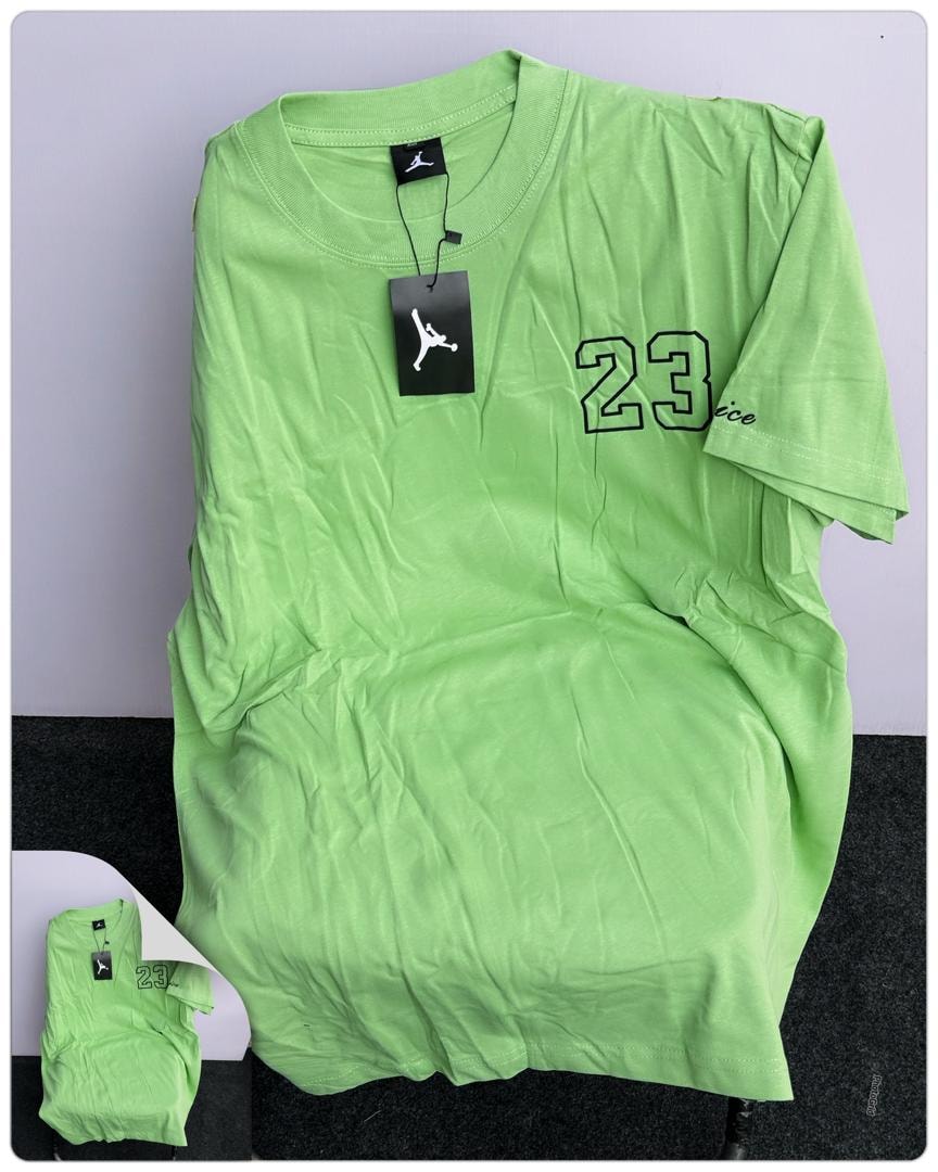 Lime green Jordan 23 round neck t-shirt with large 23 graphic and Jumpman tag.