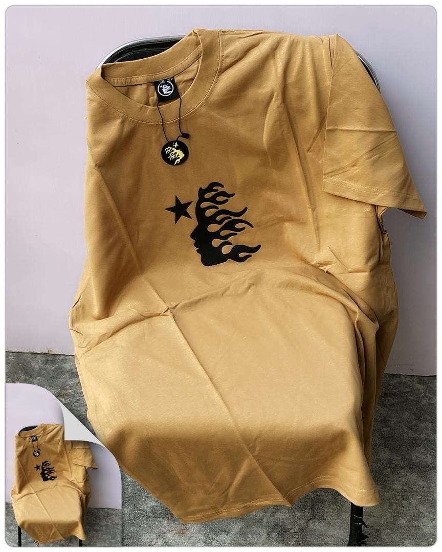 Tan round neck t-shirt with black star and flame silhouette graphic on chest.